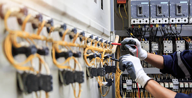 Professional Electrician technician working in Central Point, OR